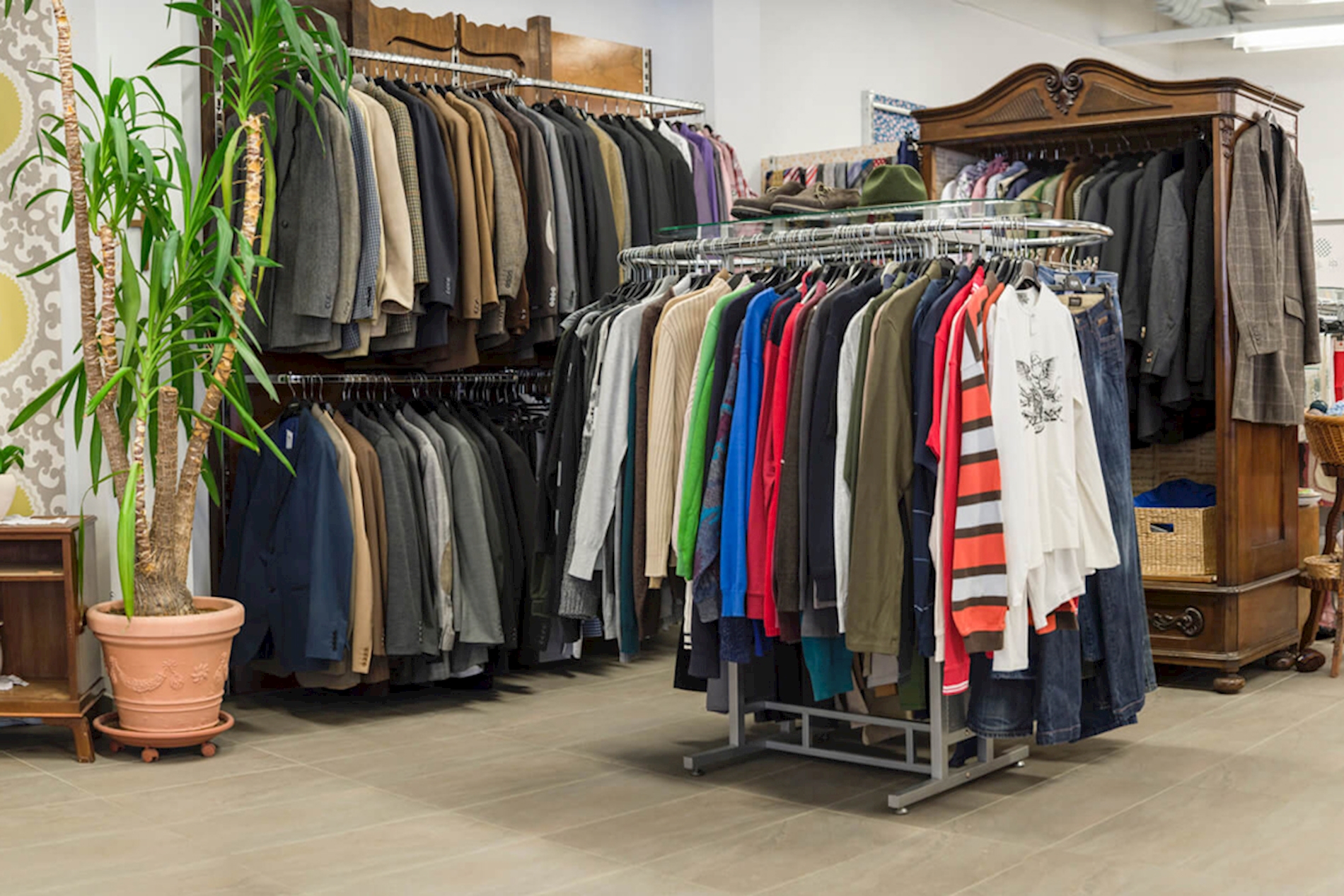 You can see several racks of trendy clothes in the Carla shop in Gleisdorf.
